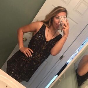 Free People sequins dress. Tag ripped out but size S/M. Good condition